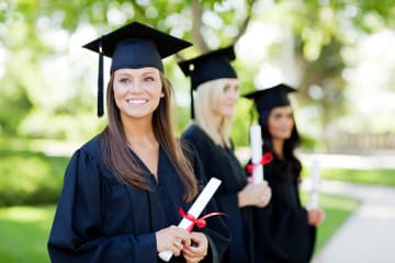 Girl holding her bachelor's degree in psychology