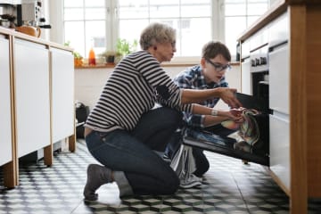 adult teaching character to a child