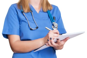 A female nurse with a stethoscope and notebook