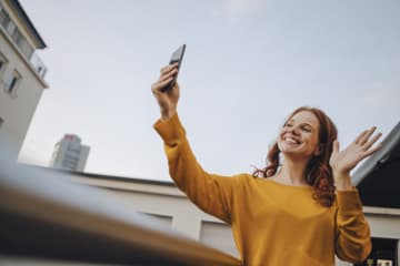 Girl saying hi to her friend over the phone