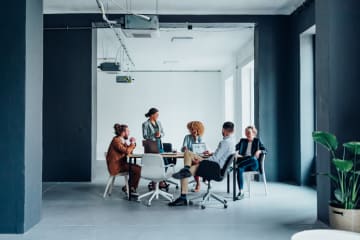 workers meeting in a modern office