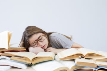 Student falls asleep while studying