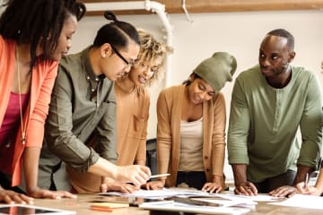 Group of students working on a project together.