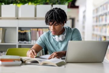 Student studying for his dissertation.