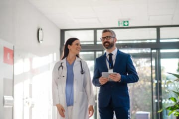 Medical professionals talking business.