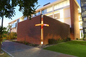 GCU building with a cross on it