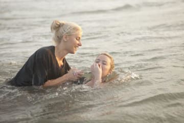 person getting baptised