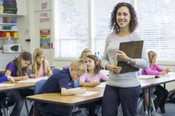 elementary teacher smiling