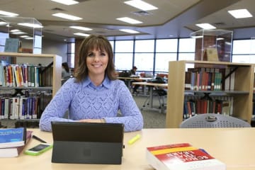 Cathy Ames in a library