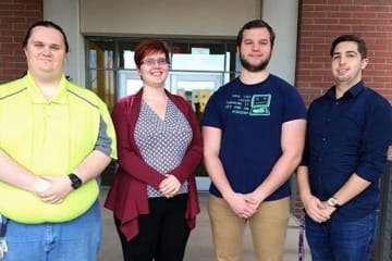 Four IT grads at GCU