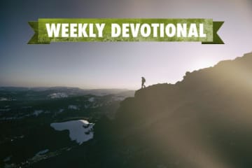 Weekly Devotional: Someone climbing down a mountain