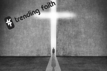 Hashtag trending faith text on top of black white cross image with a person