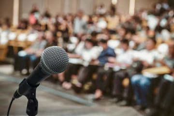 microphone in front of large audience