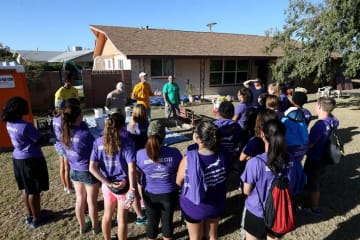 students at a community outreach event