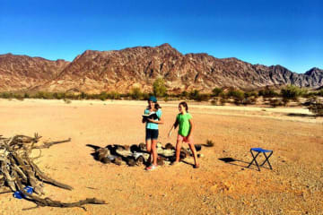 Students playing outside in the desert