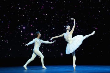 Performers dancing on a stage