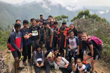 teacher and her students in India