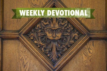 Weekly Devotional: Wooden tile with a face engraved