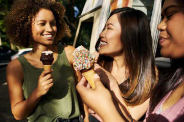 three girls eating ice cream