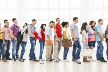 A group of people standing in a line