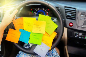 sticky notes on steering wheel