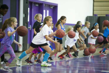 kids playing with basketballs