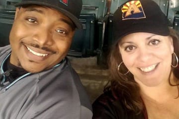 COE faculty member Katy Long and her husband at a Diamondbacks game