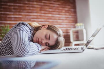 A student taking a nap