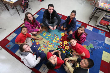 teacher and students in a circle