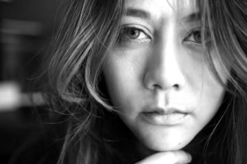 Close up in black and white of sad woman's face