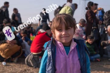 A group of refugees and a young girl with the trending faith logo