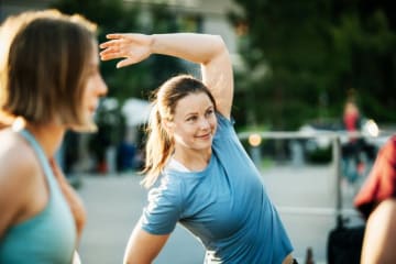 Women exercising in college