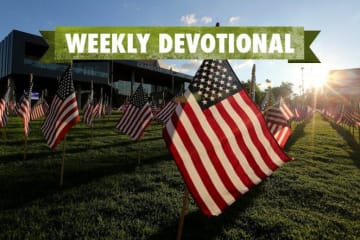 An American flag with the Weekly Devotional banner