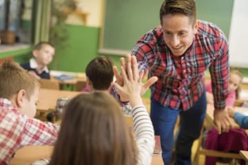 Teacher engaging with students