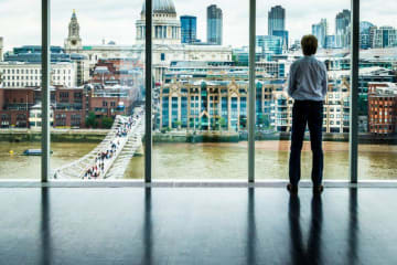 Guy looking out a window