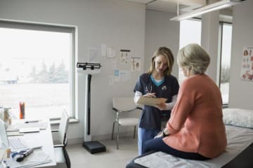 Nurse interacting with a patient