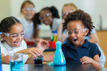 Little girls with a science experiment