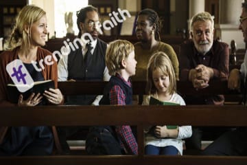 Family sits in church before service starts