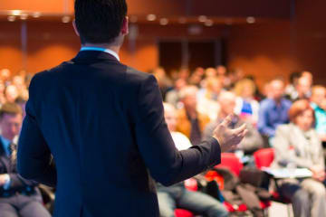 A seminary professor presenting at a convention