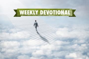 A man walking in the clouds under the Weekly Devotional banner