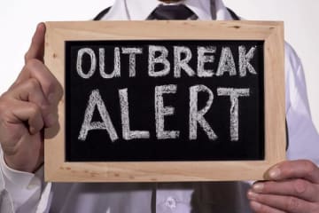 sign that says outbreak alert