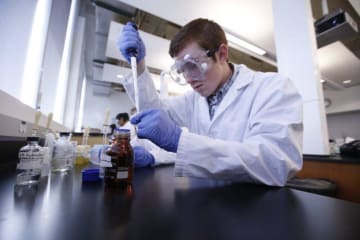 chemistry student working in a lab