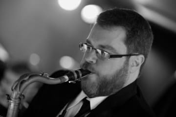 Andrew Gross playing sax