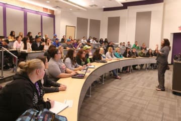 GCU students in a lecture hall on campus