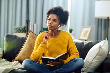 Female student journaling to improve writing skills