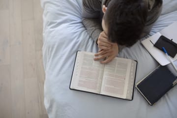 Boy reading the Bible