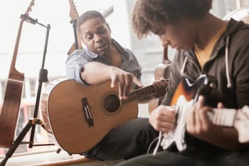 music teacher proud of his work with students