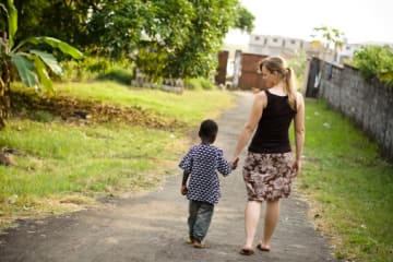 Missionary helping a child's spiritual growth while on a walk