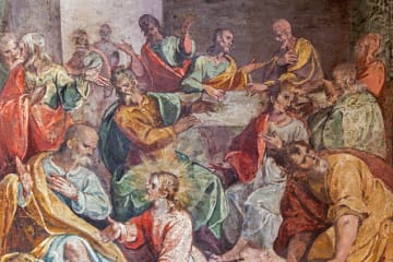 Italian art of Jesus demonstrating to honor one another by washing feet with disciples in background