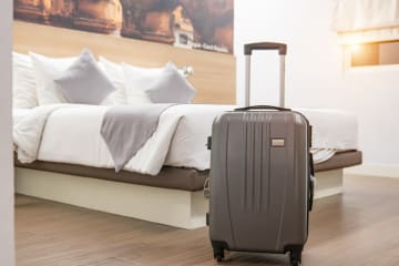 suitcase in hotel room